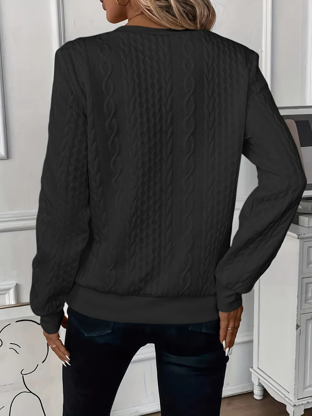 Black textured long-sleeve half-zip sweatshirt, back view
