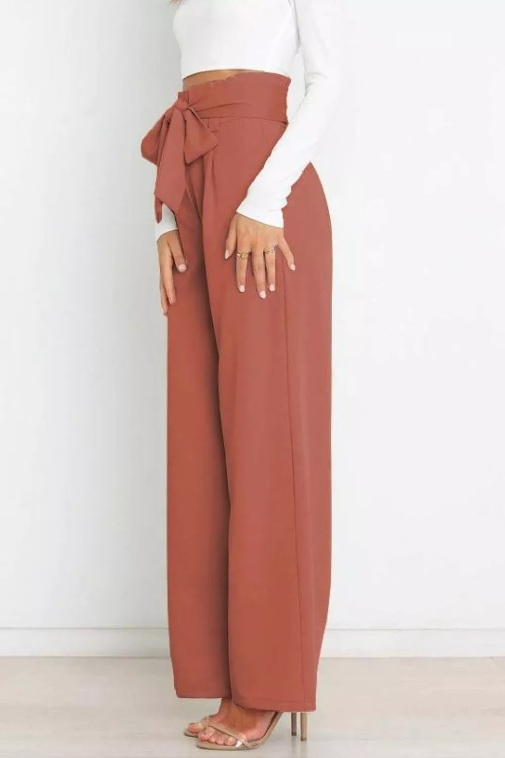 Brick red high-waist tie-front wide-leg pants with back waist tie bow detail