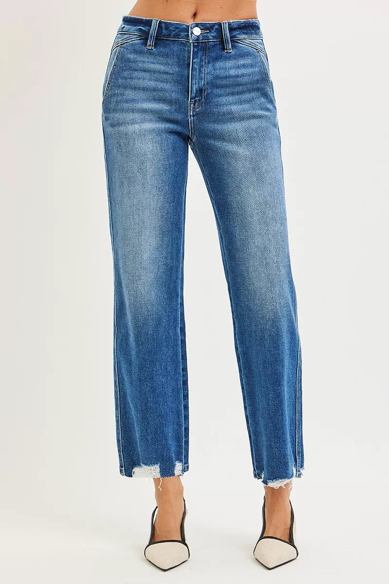 Medium wash high-rise straight jeans with frayed ankle hem detail