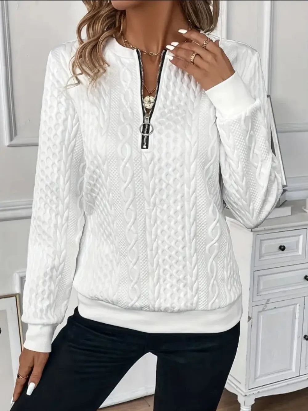 White textured half-zip sweatshirt with stand collar and long sleeves