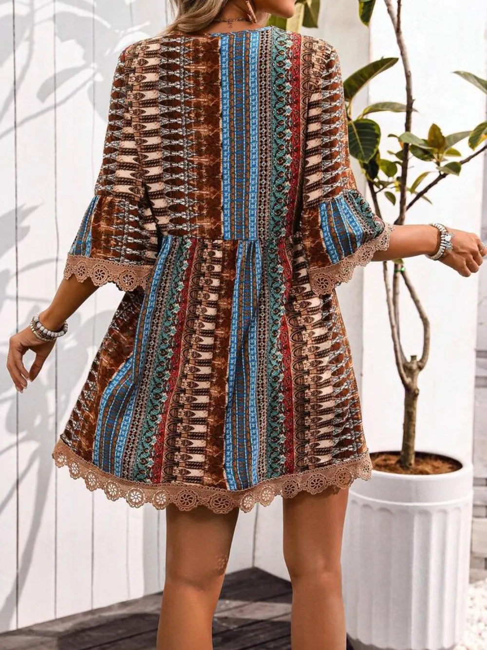 Rust, blue & brown printed 3/4 sleeve dress with lace trim, striped back panel