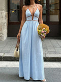 Blue striped halter maxi dress with V-neck and brown-trim straps, flowy skirt