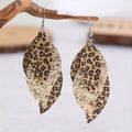 Gold-tone leopard print leaf drop earrings with glitter inset and fishhook backs