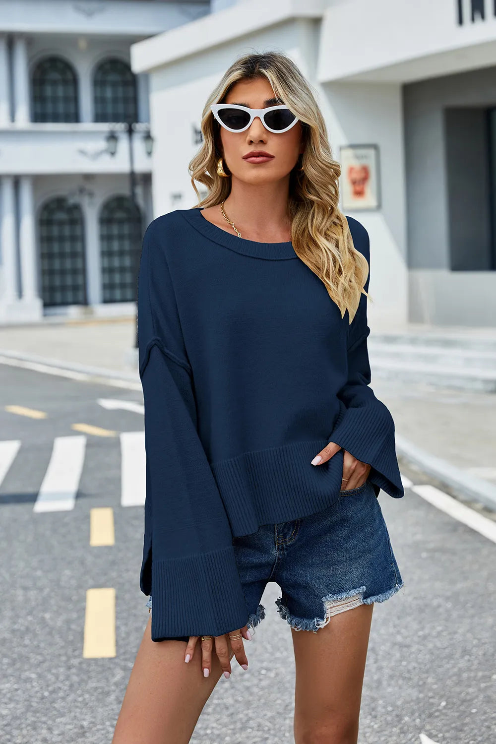 High-low slit sweater in navy, long sleeves with round neck and ribbed bottom