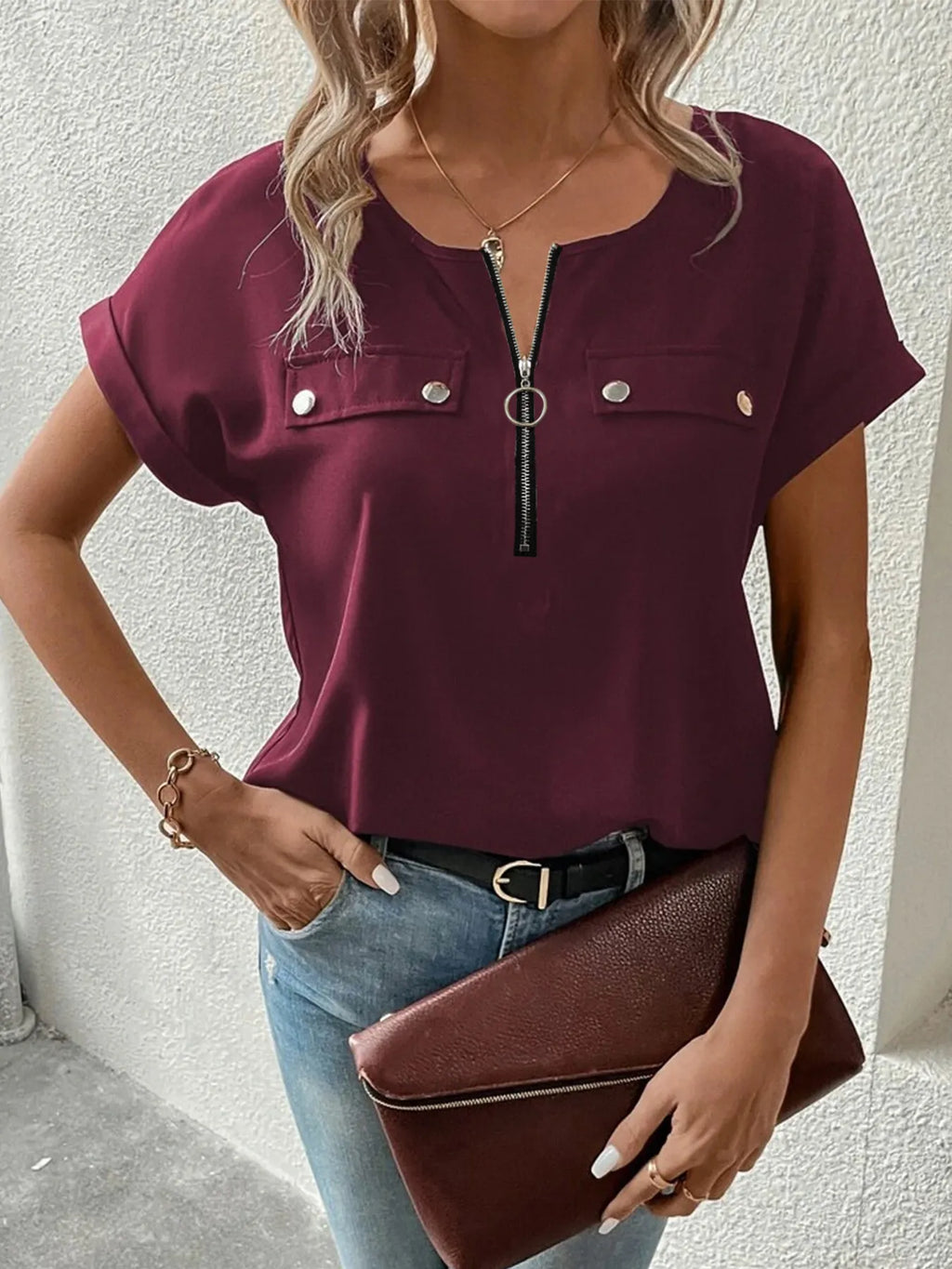 Burgundy zipper front short sleeve blouse with chest snap buttons and scoop neck