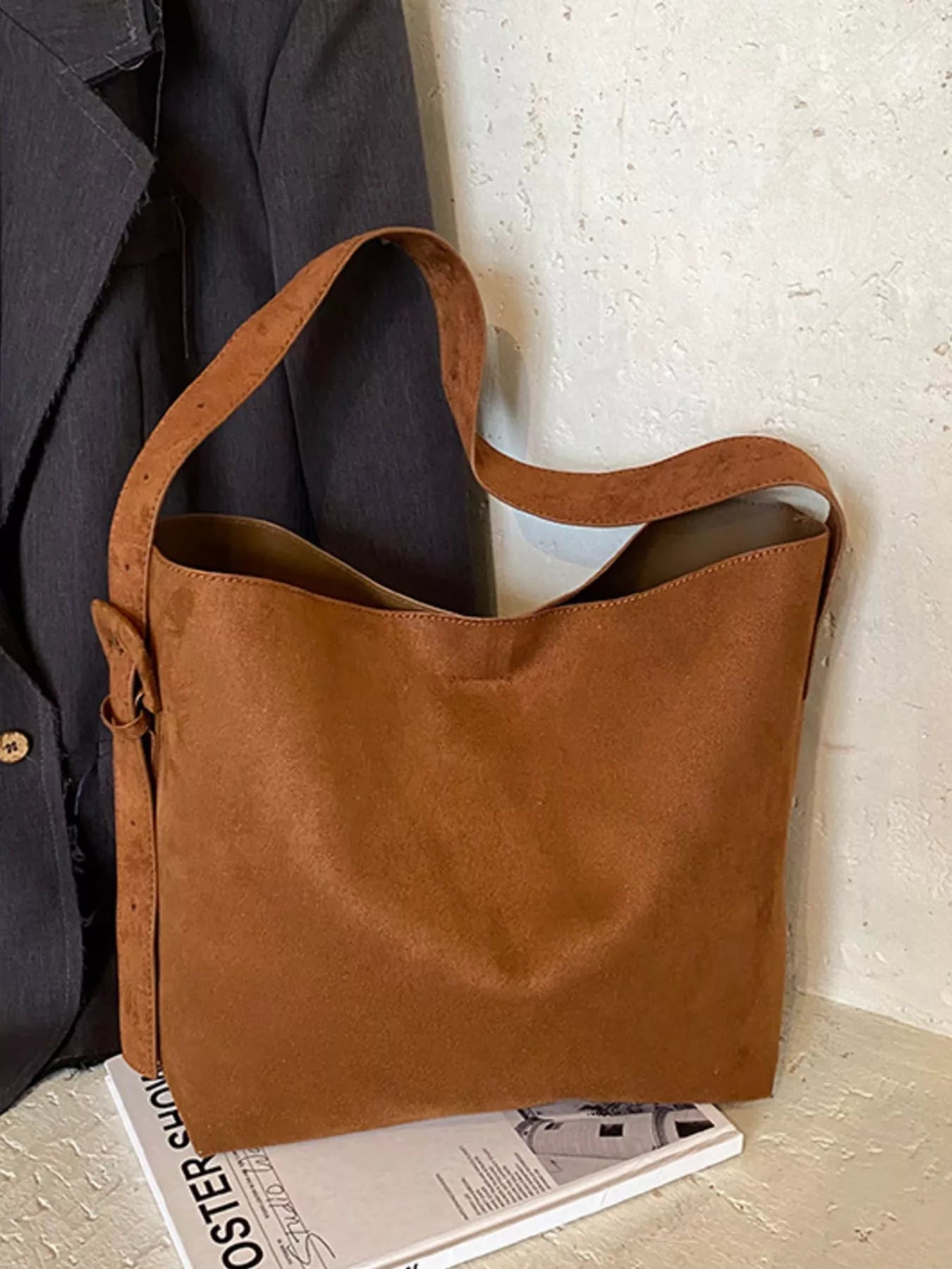 Brown tote bag with wide opening, sturdy handle, and inner top view