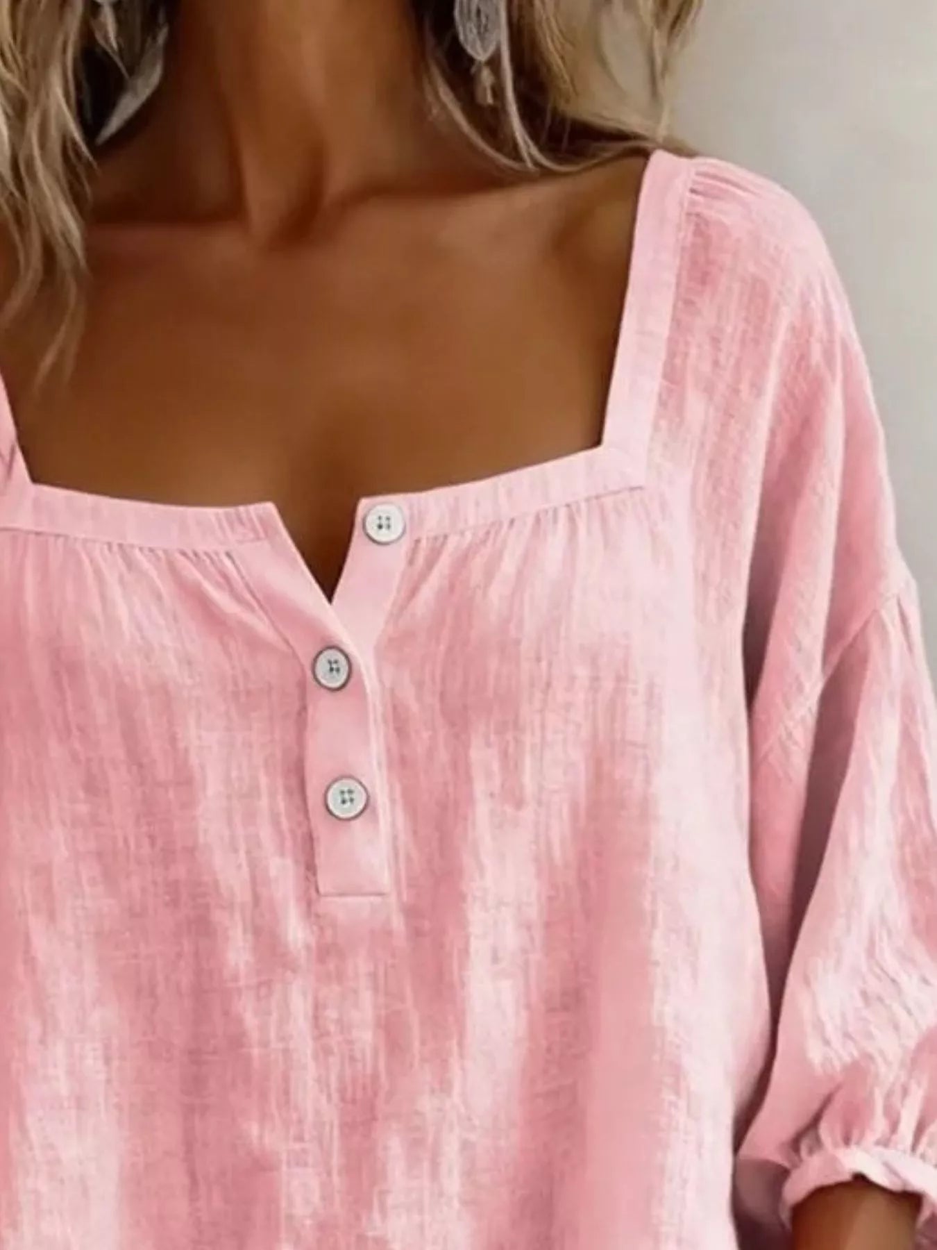 Plus-size pink square-neck blouse with three-button front and gathered neckline