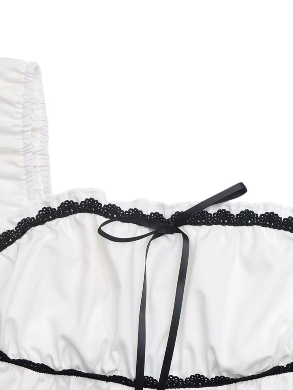 White blouse neckline with black lace trim and ribbon bowknot detail