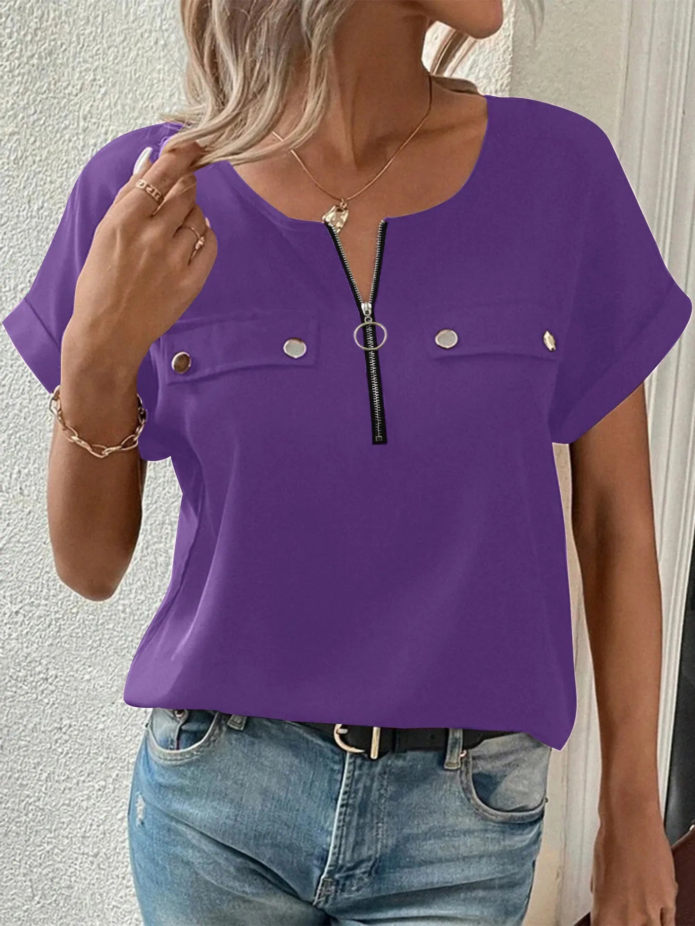 Purple short-sleeve blouse with center front zipper and button chest pockets