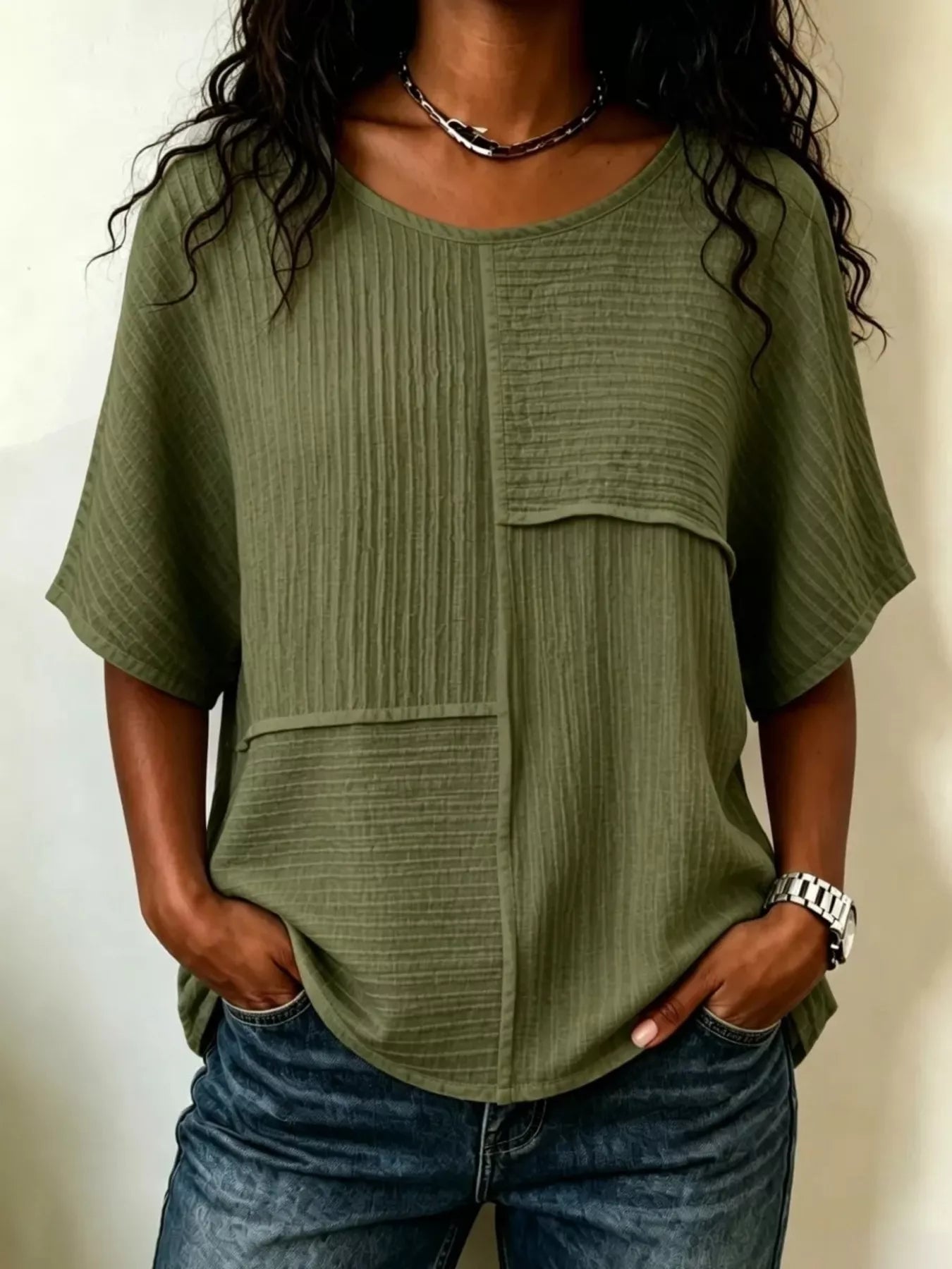 Textured round-neck half-sleeve blouse, olive green with front patch pockets and button placket
