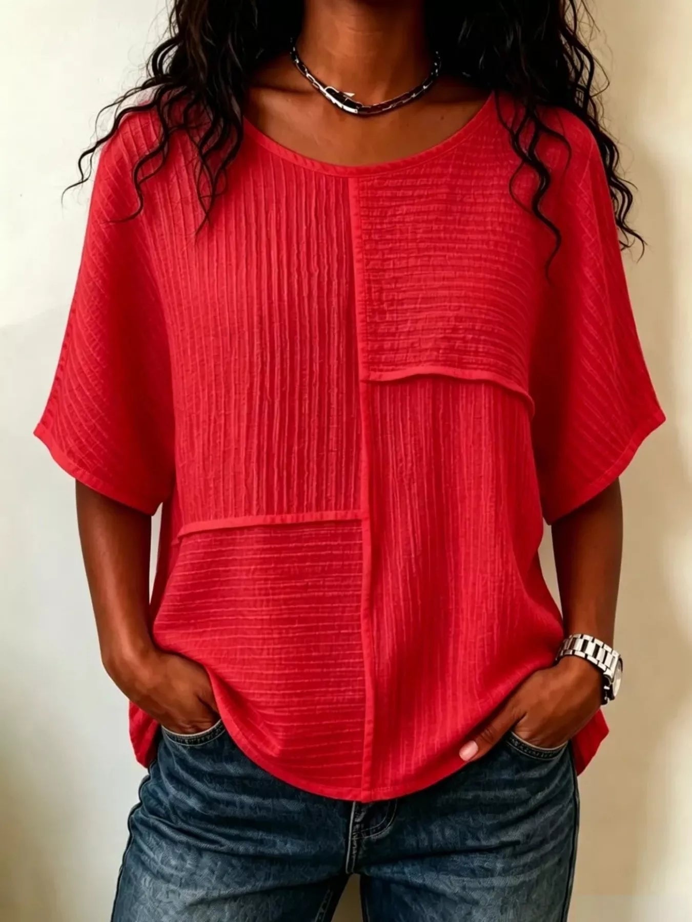 Red textured round-neck half-sleeve blouse with vertical seam panel detail