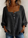 Plus-size black square-neck button-detail blouse with puff sleeves and front placket