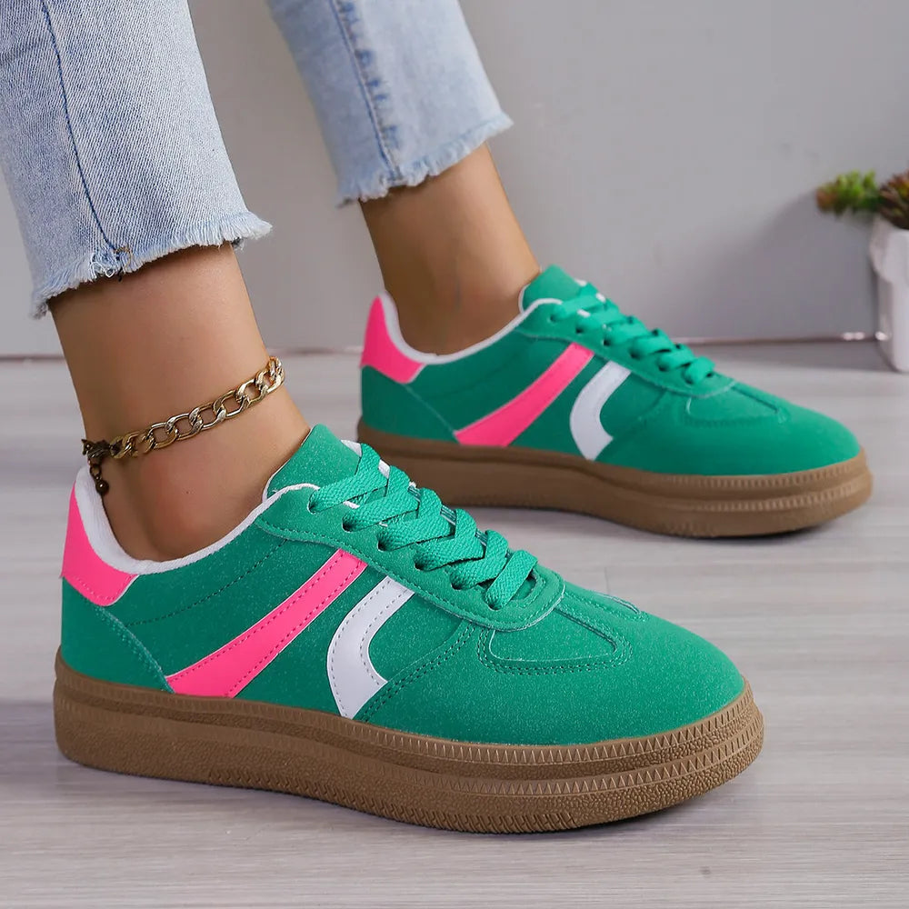 Green and pink platform sneakers with white side panels, lace-up front