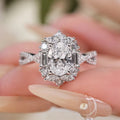 1-carat moissanite halo ring in sterling silver, oval center stone with side accents