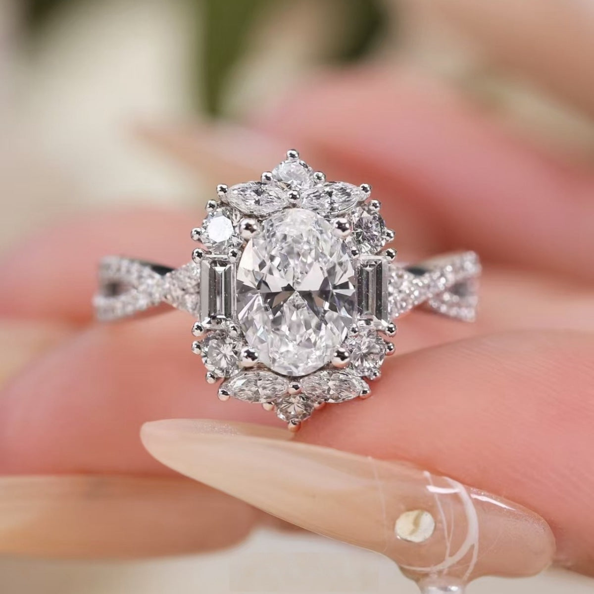 1-carat moissanite halo ring in sterling silver, oval center stone with side accents