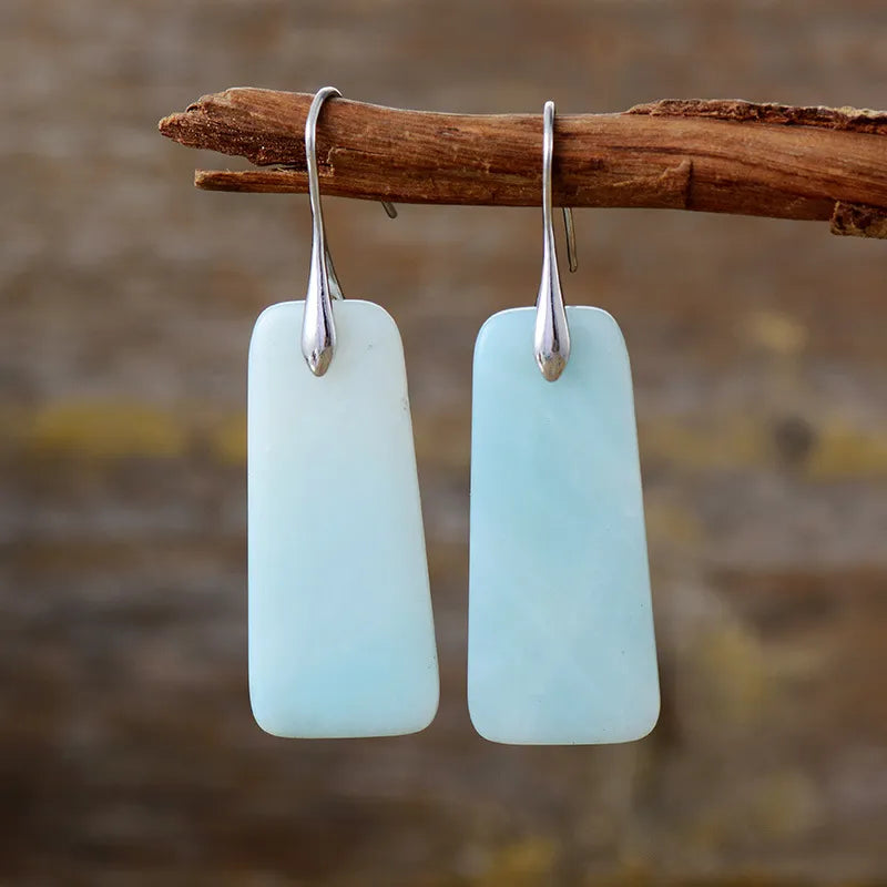 Light blue rectangular stone drop earrings with silver-tone hooks
