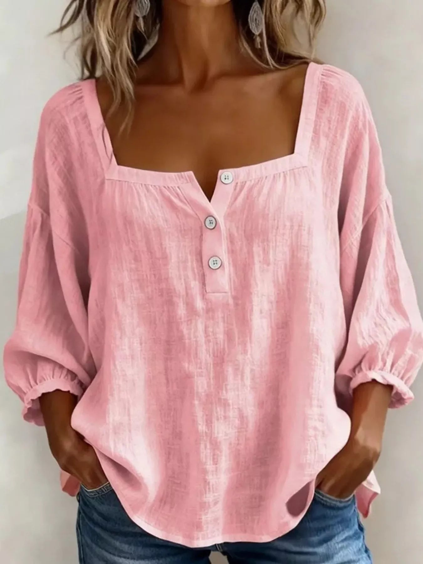 Plus-size pink square-neck button-detail blouse with puff sleeves and front buttons
