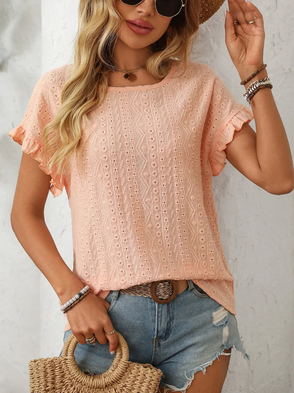 Light pink eyelet short-sleeve top, round neck with flutter sleeves