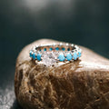Turquoise and clear zircon studded band ring with center stone